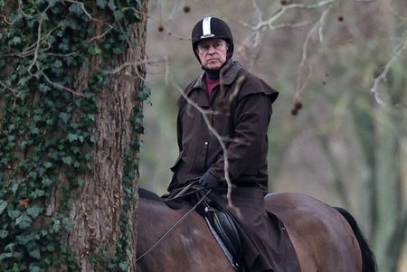 FILE PHOTO: Andrew Mountbatten-Windsor rides a horse in Windsor Great Park